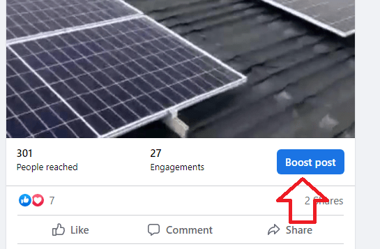 Demonstrating how to promote a post on Facebook by clicking the boost button
